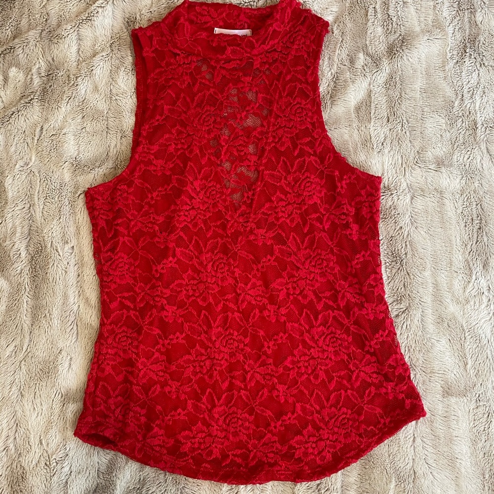 Red sleeveless shirt